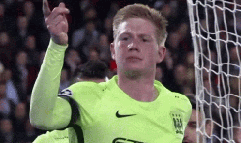 A Soccer Player Wearing A Neon Green Nike Jersey GIF