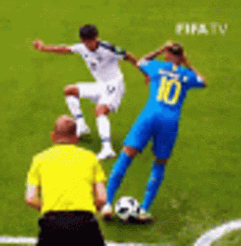a soccer player wearing a number 10 jersey kicks the ball