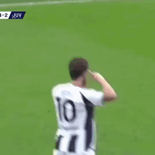 A Soccer Player Wearing A Number 10 Jersey Stands On A Field GIF