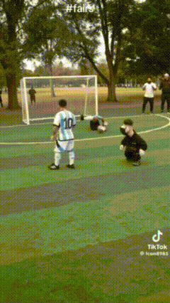 A Soccer Player Wearing A Number 10 Jersey Stands On The Field GIF