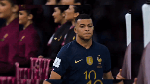 a soccer player wearing a number 10 jersey