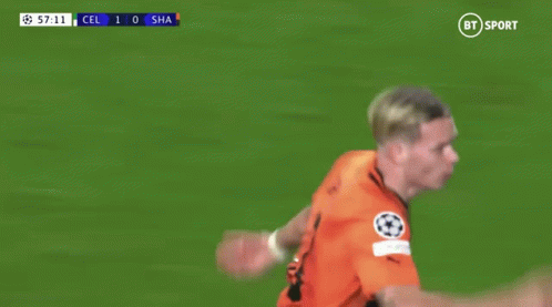 A Soccer Player Wearing A Number 11 Jersey Is Running On The Field GIF