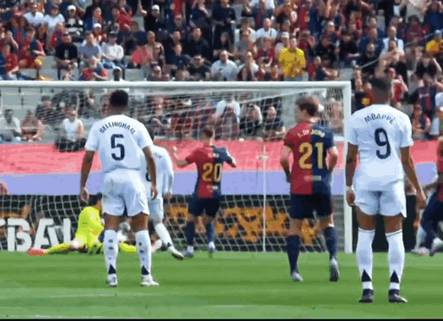 A Soccer Player Wearing A Number 21 Jersey Stands On The Field GIF
