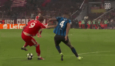A Soccer Player Wearing A Number 42 Jersey Kicks The Ball GIF