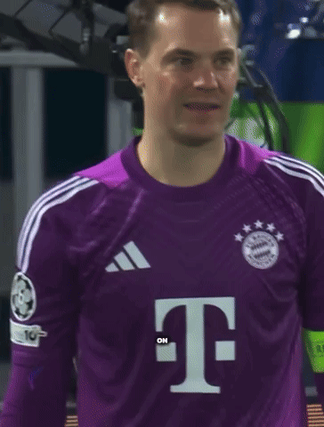 A Soccer Player Wearing A Purple Jersey With Bayern Munchen Written On It GIF