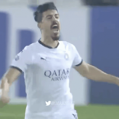 A Soccer Player Wearing A Qatar Airlines Jersey Is Celebrating GIF