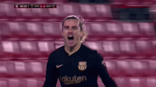 A Soccer Player Wearing A Rakuten Jersey Is Celebrating A Goal During A Game . GIF