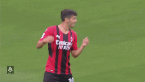 A Soccer Player Wearing A Red And Black Jersey With Emirates Fly Better On It GIF