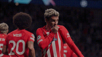 A Soccer Player Wearing A Red And White Jersey With The Number 20 On The Back GIF