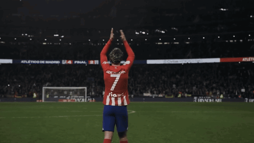 A Soccer Player Wearing A Red And White Jersey With The Number 7 On It GIF