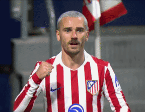 A Soccer Player Wearing A Red And White Striped Jersey With The Letters Atm On The Front GIF