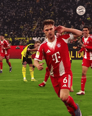A Soccer Player Wearing A Red And White T-Mobile Jersey GIF