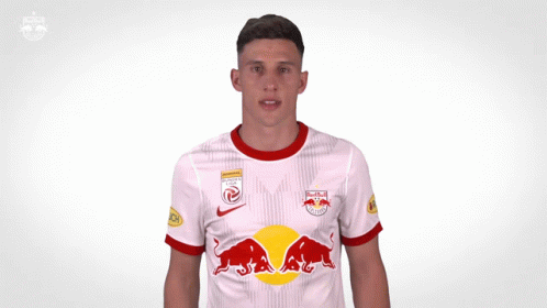 A Soccer Player Wearing A Red Bull Jersey Giving A Thumbs Up GIF