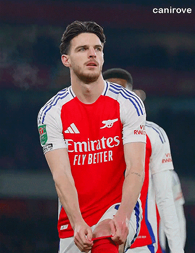A Soccer Player Wearing A Red Emirates Fly Better Shirt GIF