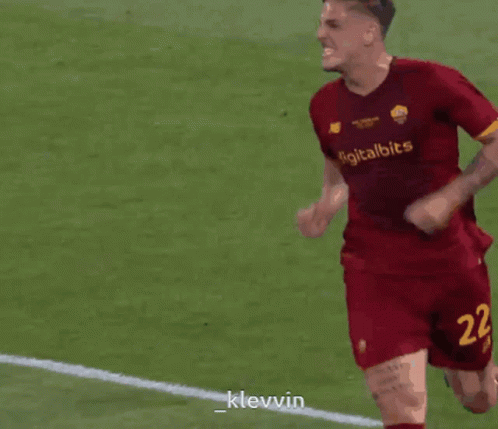 A Soccer Player Wearing A Red Jersey With Digitalbits Written On It GIF