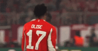 A Soccer Player Wearing A Red Jersey With The Number 17 On It GIF