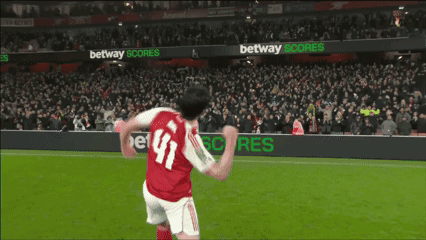 A Soccer Player Wearing A Red Jersey With The Number 41 On It GIF