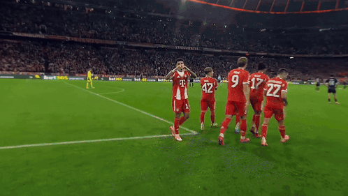 A Soccer Player Wearing A Red Jersey With The Number 42 On It GIF
