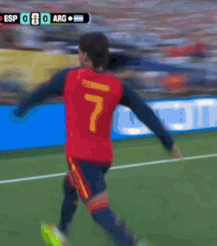 A Soccer Player Wearing A Red Jersey With The Number 7 On It GIF