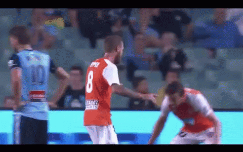 A Soccer Player Wearing A Red Jersey With The Number 8 On The Back GIF
