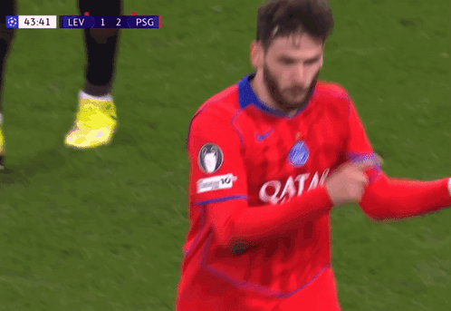 A Soccer Player Wearing A Red Jersey With The Word Qatar On The Front GIF