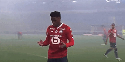 A Soccer Player Wearing A Red Shirt That Says Boulanger On It GIF
