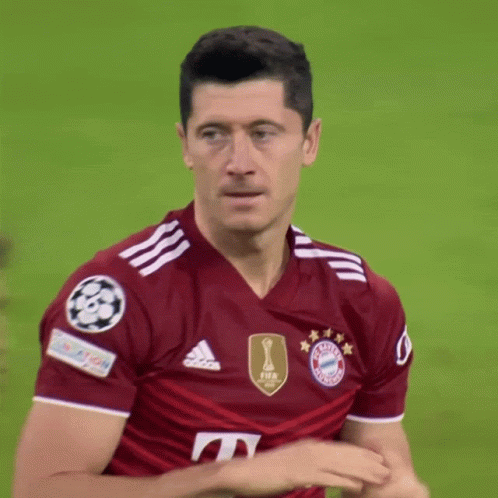 A Soccer Player Wearing A Red Shirt That Says Fifa GIF