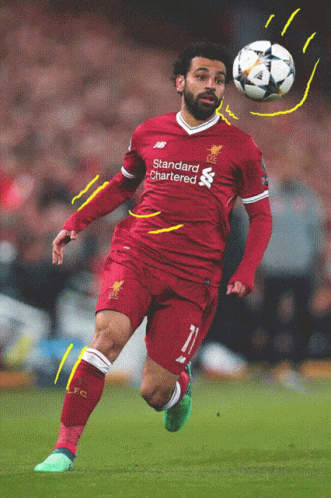 A Soccer Player Wearing A Red Shirt That Says Standard Chartered On It GIF