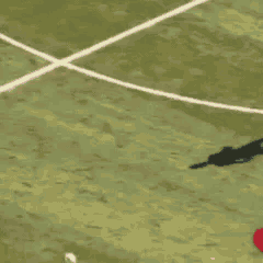 a soccer player wearing a red shirt with a s on it