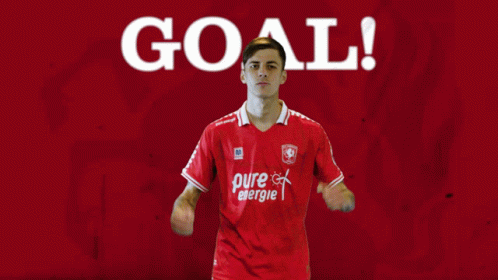 A Soccer Player Wearing A Red Shirt With Pure Energie On It GIF