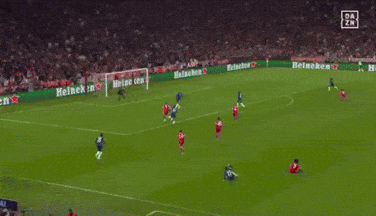 A Soccer Player Wearing A T-Mobile Jersey Stands On A Field GIF