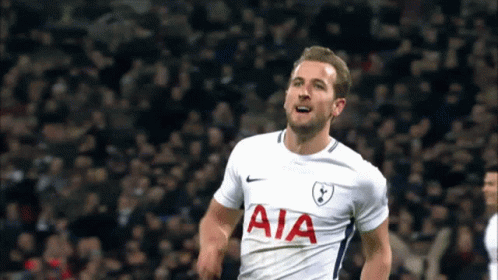 A Soccer Player Wearing A White Aia Jersey Celebrates A Goal GIF