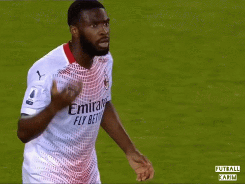 A Soccer Player Wearing A White Emirates Fly Bet Jersey GIF