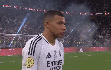 A Soccer Player Wearing A White Emirates Jersey GIF