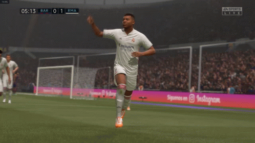 A Soccer Player Wearing A White Emirates Jersey Runs On The Field GIF