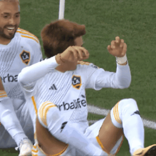 A Soccer Player Wearing A White Herbalife Jersey GIF