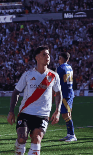 A Soccer Player Wearing A White Jersey That Says Codere GIF