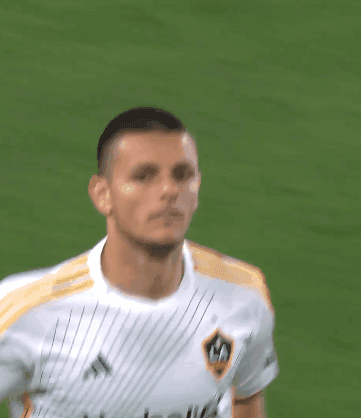 A Soccer Player Wearing A White Jersey With The Letter A On The Front GIF