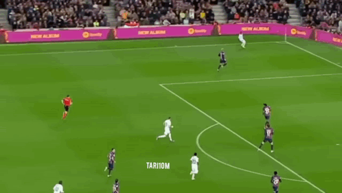 A Soccer Player Wearing A White Jersey With The Number 22 On It GIF