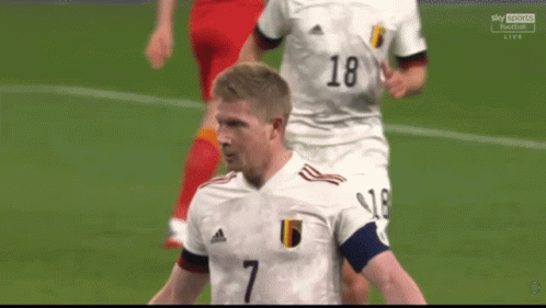 A Soccer Player Wearing A White Jersey With The Number 7 GIF