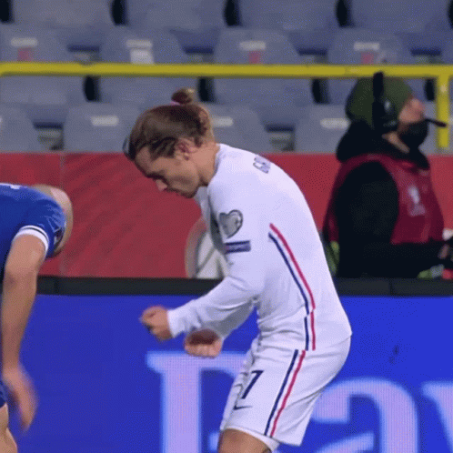 A Soccer Player Wearing A White Jersey With The Number 7 On It GIF