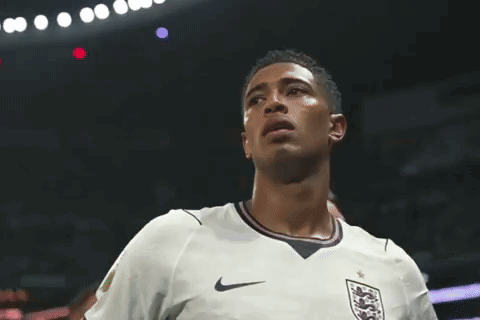 A Soccer Player Wearing A White Nike Jersey With A Lion On The Front GIF