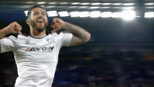 A Soccer Player Wearing A White Shirt That Says Avon GIF
