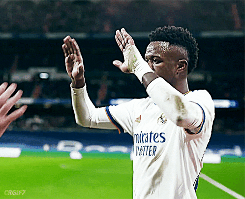 A Soccer Player Wearing A White Shirt That Says Emirates Visitor GIF