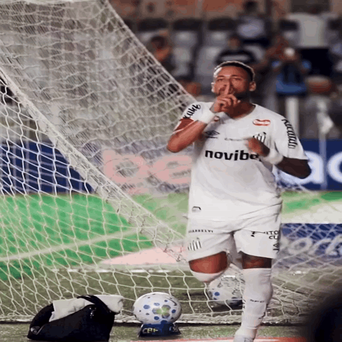 A Soccer Player Wearing A White Shirt That Says Novvibe On It GIF