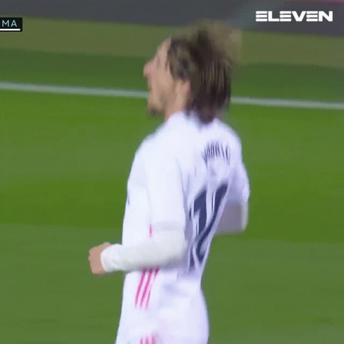 A Soccer Player Wearing A White Shirt With Emirates On The Front GIF