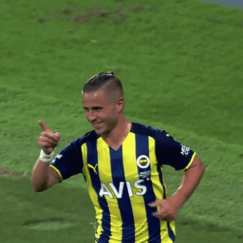 A Soccer Player Wearing A Yellow And Blue Striped Jersey With Avs On It GIF