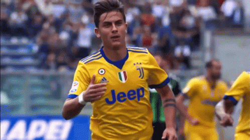 A Soccer Player Wearing A Yellow Jeep Jersey GIF