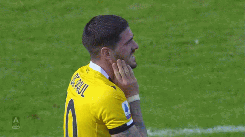 A Soccer Player Wearing A Yellow Jersey That Says Serie A GIF