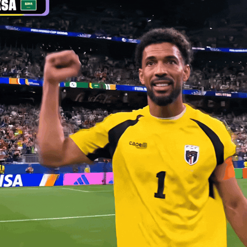 A Soccer Player Wearing A Yellow Shirt With The Number 1 On It GIF